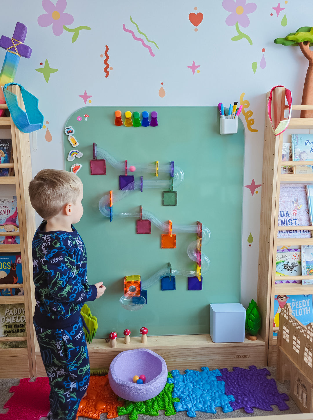 A Maynetic board in sage with magnetic tile ball run set up showing strong magnetic properties.