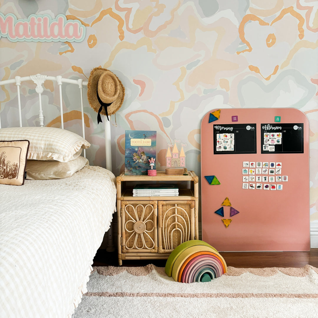 Maynetic board being used in a bedroom for a schedule and chore chart.